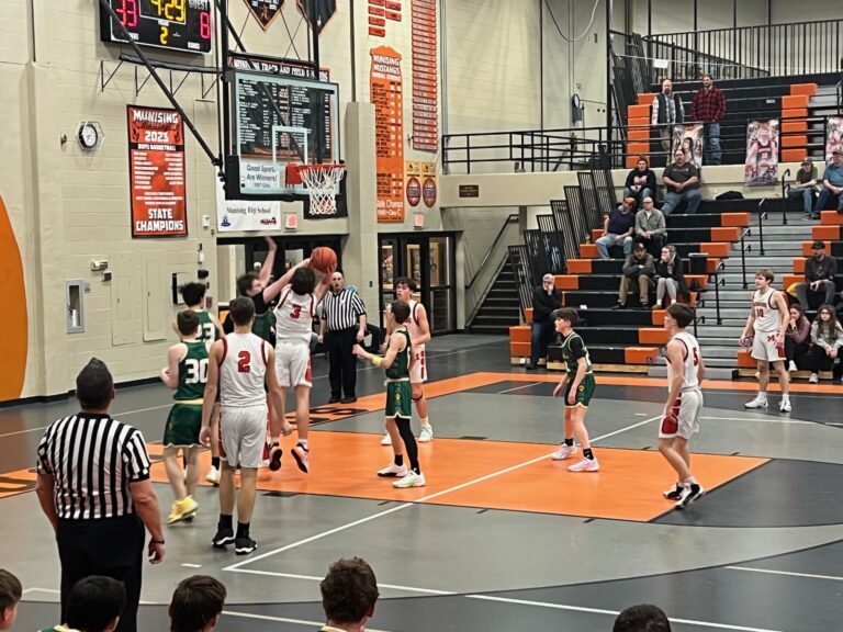 Large victory for Munising in the basketball double header. Munising boys over the Carney Nadeau Wolves 71-23.