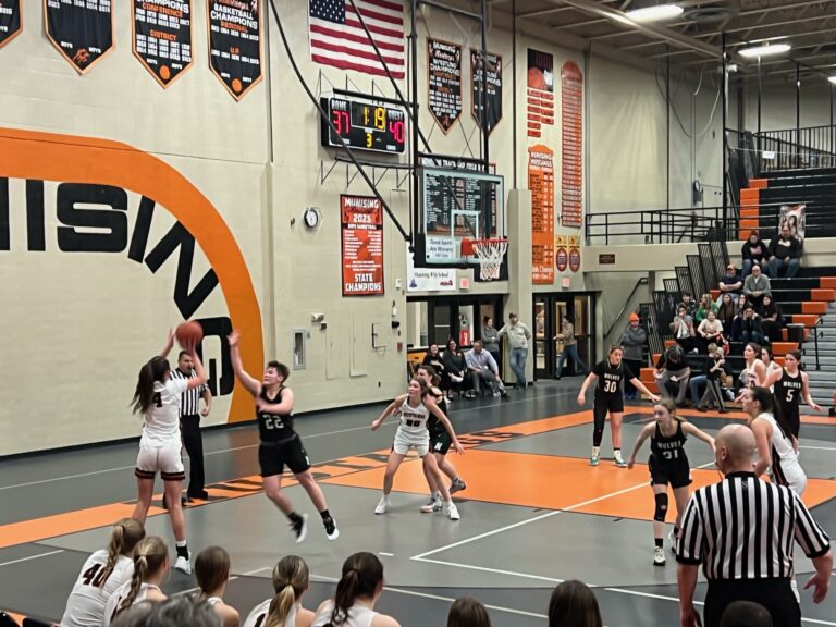 A raucous victory tonight in Munising. Mustang girls over the Careny Nadeau Wolves 58-54
