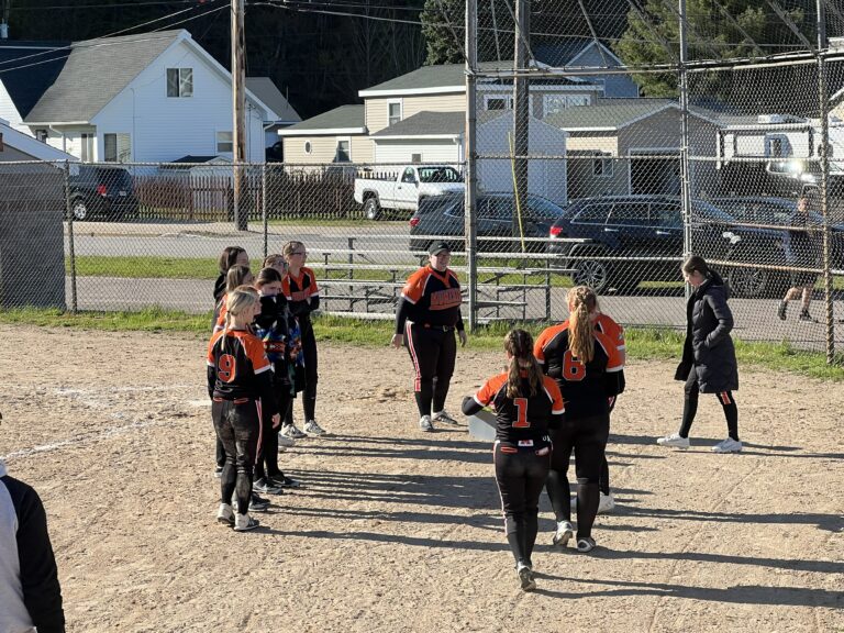 Mustang girls softball falls to the Carney Nedeau Wolves 29-13 in the first game of the double header.