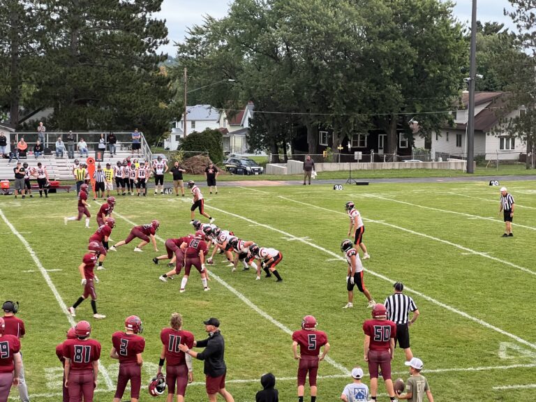 The Munising Mustangs defeat the Ironwood Red Devils 48-14.