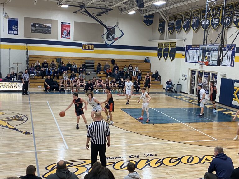 In a fast paced game the Mustang boys defeat the Bark River-Harris Broncos in Bark River, 78-43.